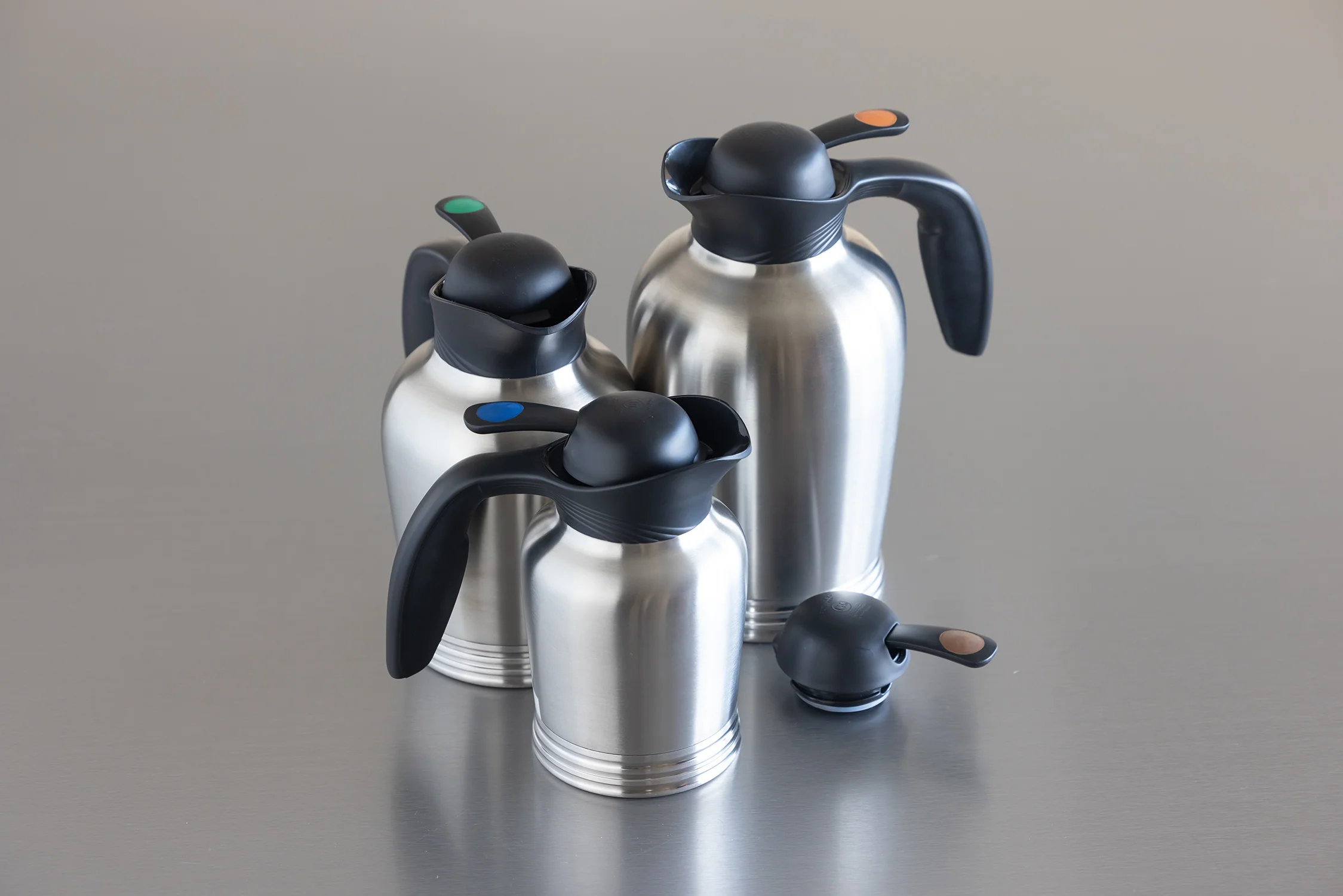ErgoServ® 1-Liter Stainless Vacuum Insulated Carafe with Push Button Lid in Brushed Stainless and Black - Image 2