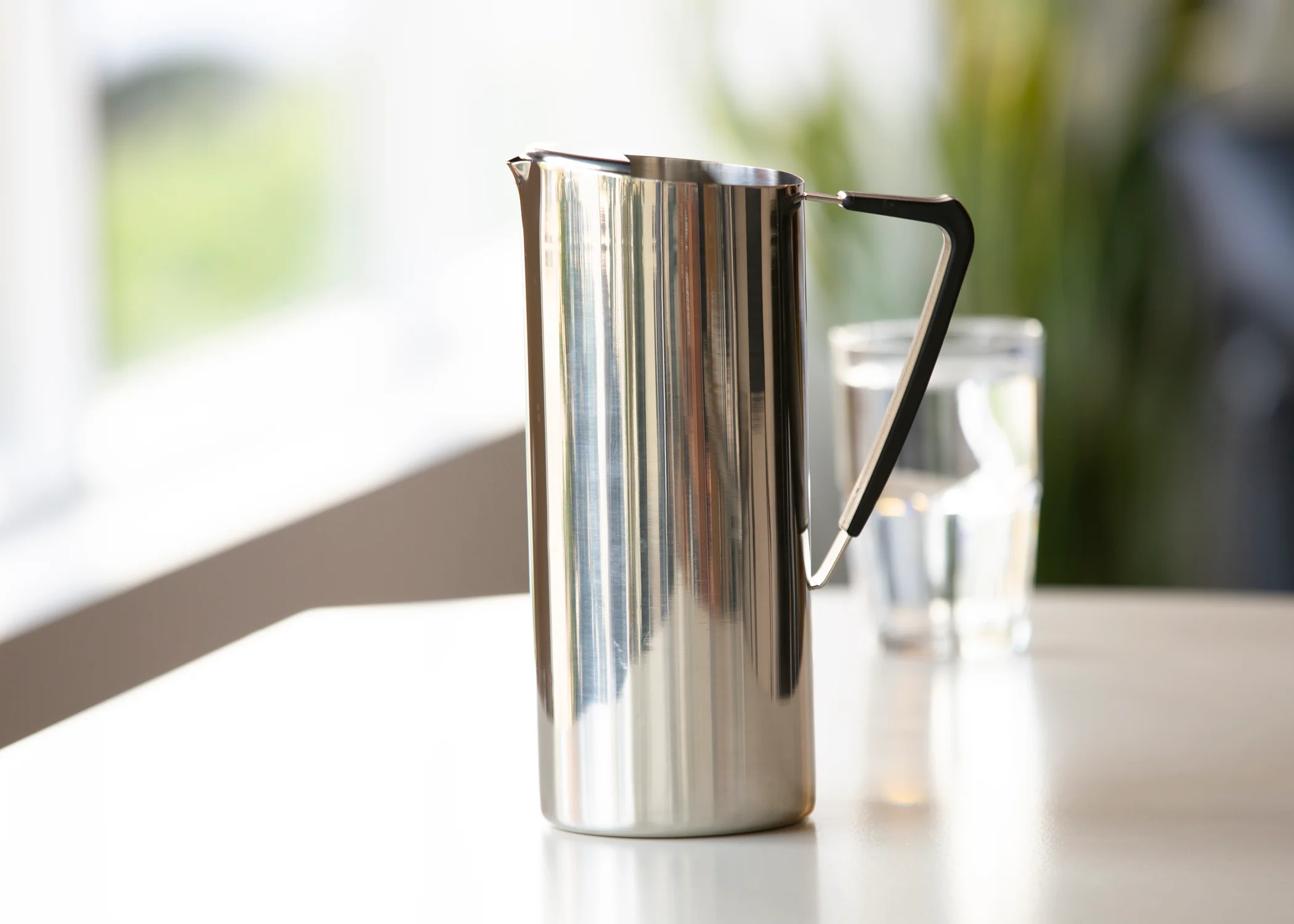 Slim 1.9-Liter Stainless Water Pitcher with Ice Guard in Polished Stainless - Image 2