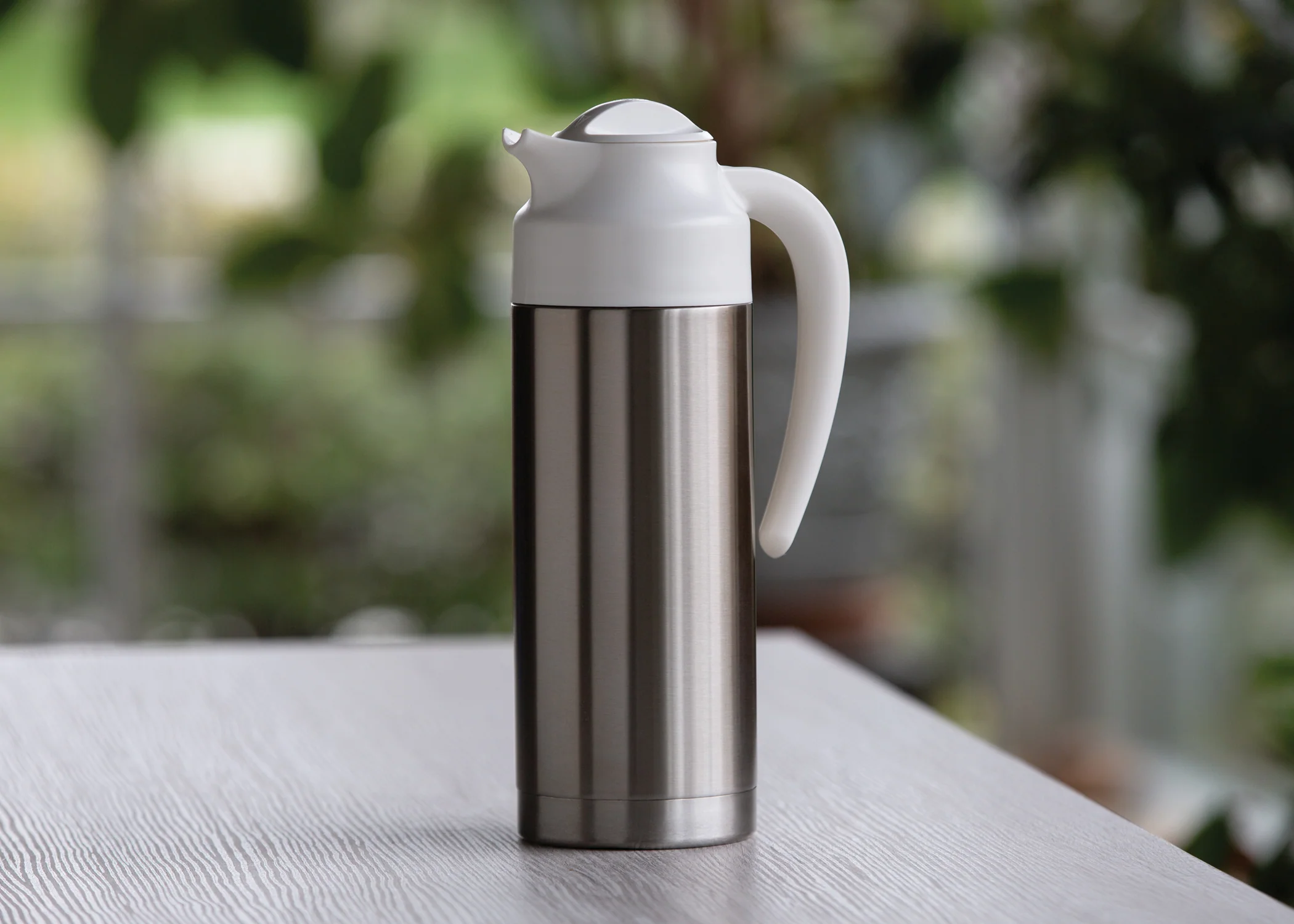 SteelVac® 1-Liter Vacuum Insulated Creamer with Steel Base in Brushed Stainless and White - Image 2