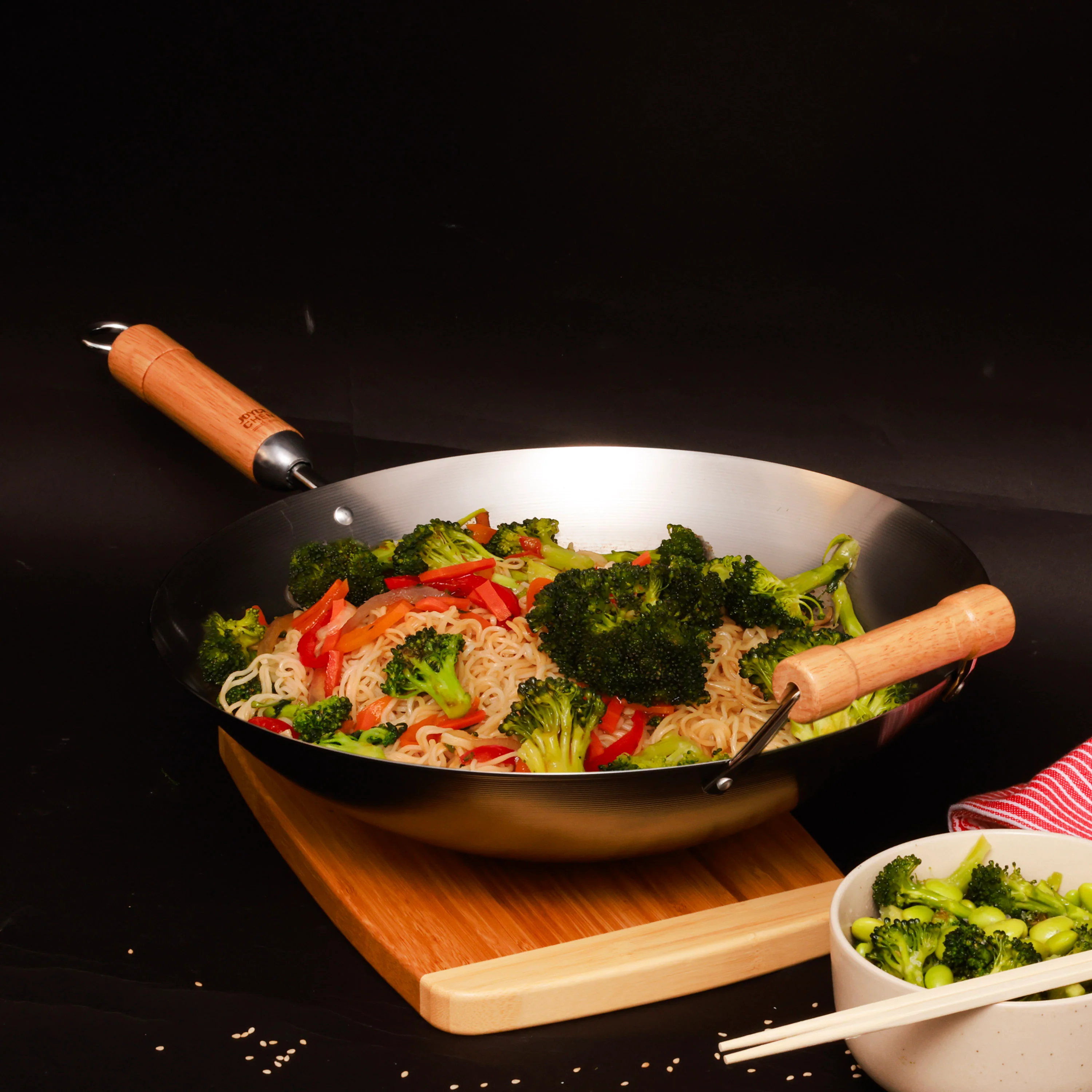 Winco J20-1140 14 Inch Classic Series Round Bottom Wok with Birch Handles Carbon Steel - Image 4