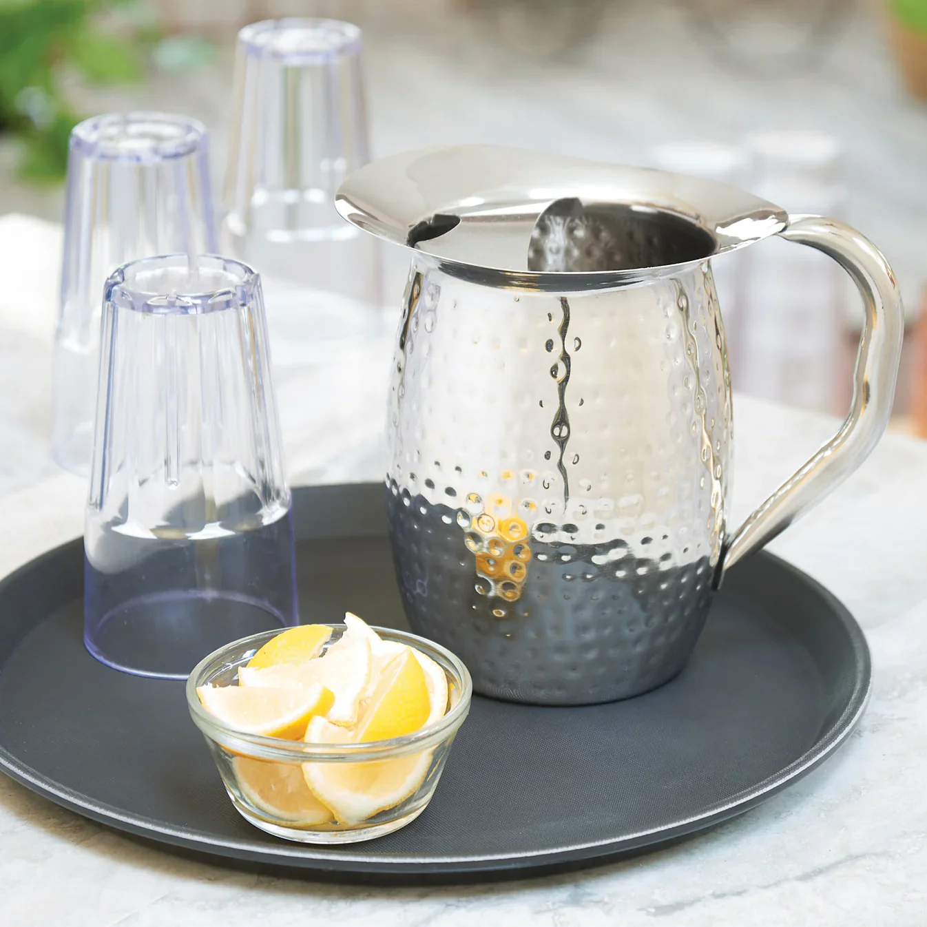 Winco WPB-2CH 2 Qt. Hammered Ice Catcher Bell Pitcher Stainless Steel Mirror Finish - Image 2